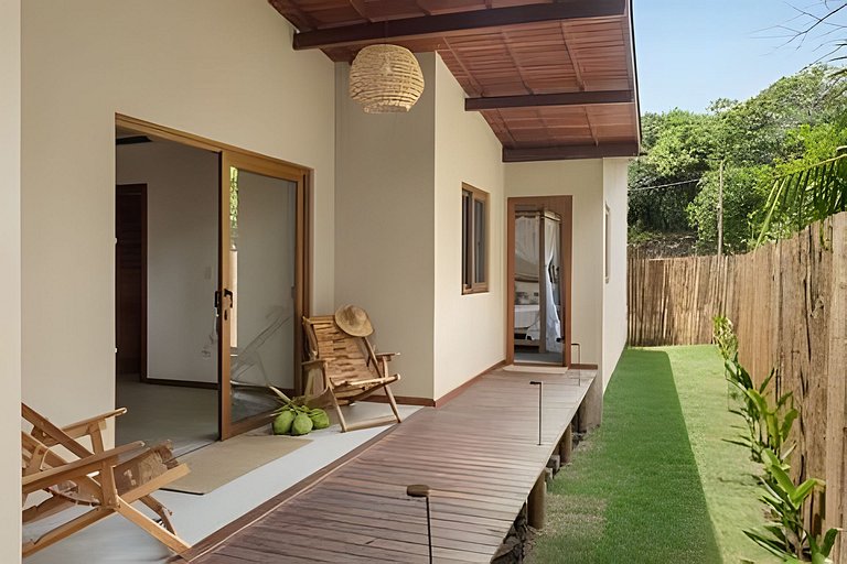 Casa charmosa no jardim: Brisas do Cassange
